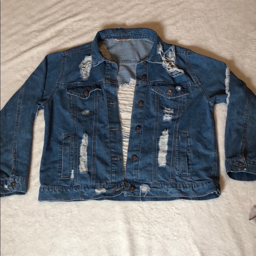 Large, distressed denim jacket (medium wash)
